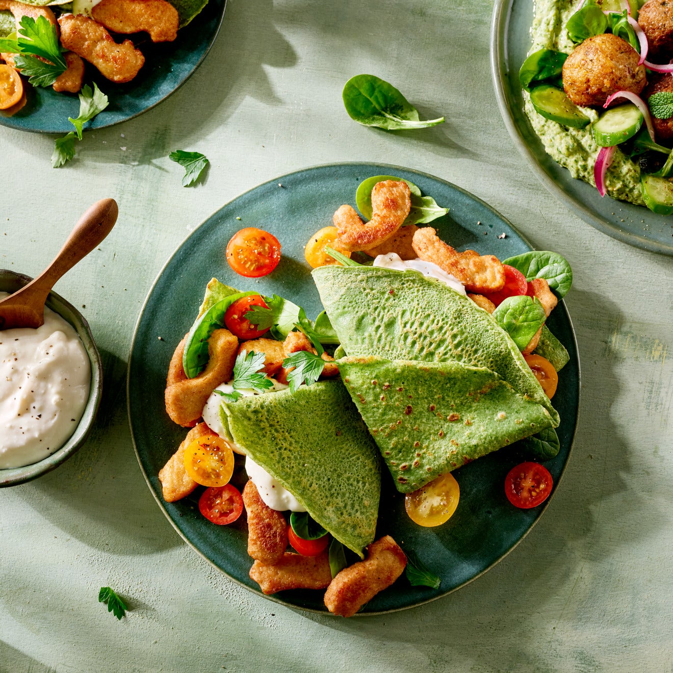 Stuffed spinach crêpes with lightly roasted pieces Stuffed spinach crêpes with lightly roasted pieces