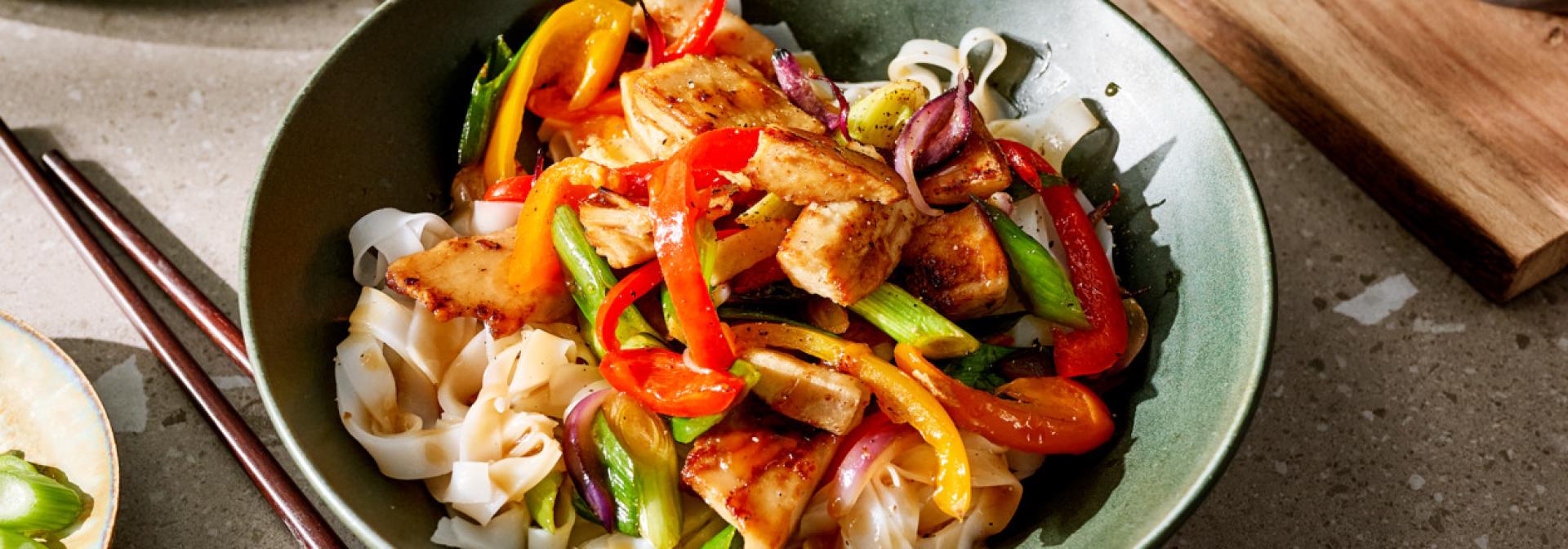 Vegetable noodle stir-fry with vegan fillet pieces