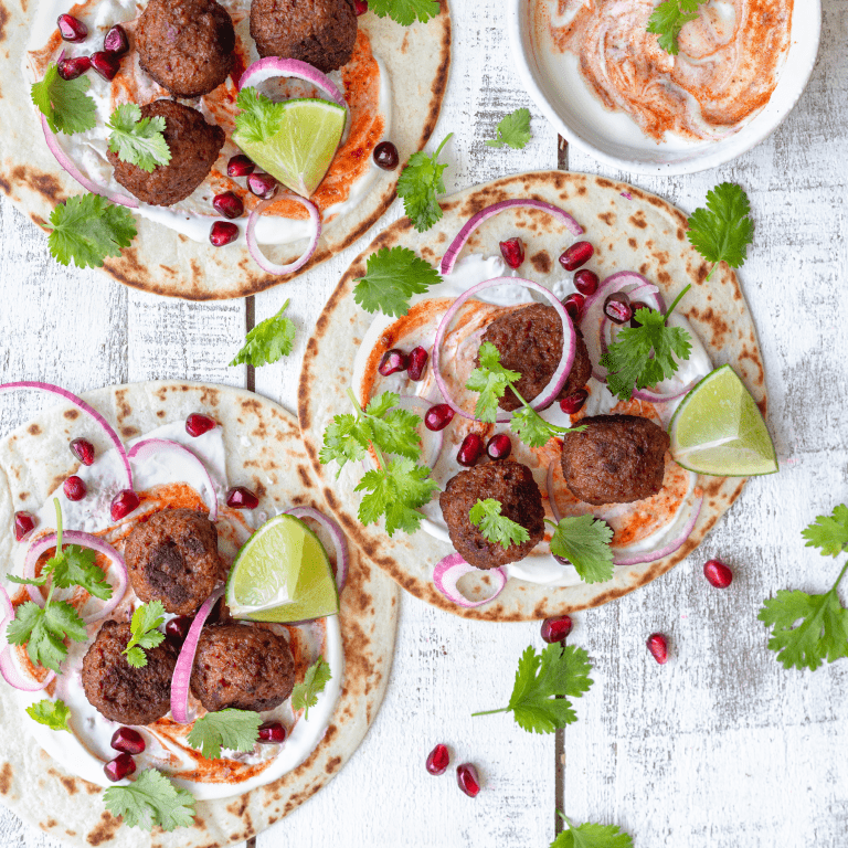 Vegetarian tacos with yogurt and harissa sauce